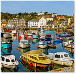 Photo of boats in a harbour in Cornwall