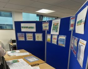 An image of a blue board with a trainee students final year project
